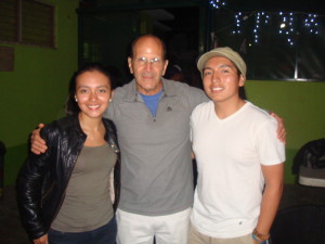 Hermano Juan Mendez (SPR' 10, Beta Beta) poses with wife Mayte Ortiz and shelter founder Padre Solalinde